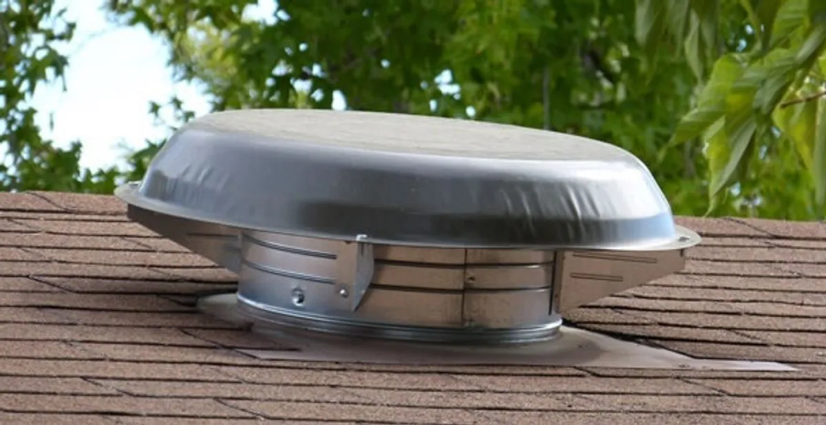 attic fan installation services with low-profile roof ventilation unit in Baltimore, MD