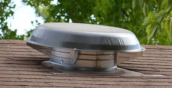 attic fan installation services with low-profile roof ventilation unit in Baltimore, MD
