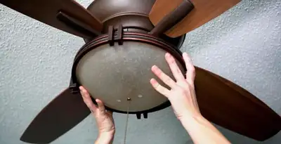 Ceiling fan repair and reinstallation on ceiling mount in Baltimore, MD