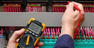 electrical service showing professional testing and troubleshooting of electrical panel by licensed electricians in Baltimore, MD