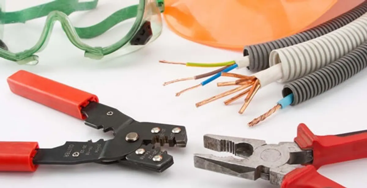 Electrical wiring repair with professional tools and safety equipment in Curtis Bay, MD