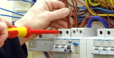 electrician services performing professional electrical panel wiring and connections in Baltimore, MD