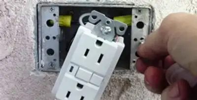 gfci circuits service showing installation of a ground fault circuit interrupter outlet by licensed electricians in Baltimore, MD