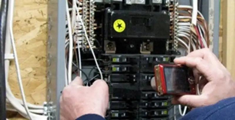 Home electrical inspection of circuit breaker panel by licensed electrician in Baltimore, MD