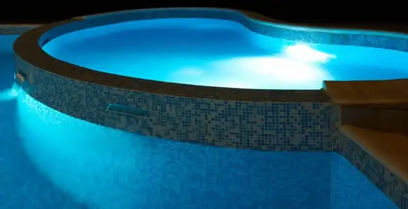 pool light installation and repair services highlighting illuminated pool interior lighting in Baltimore, MD