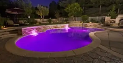 pool light installation and repair services illuminating a residential swimming pool in Baltimore, MD