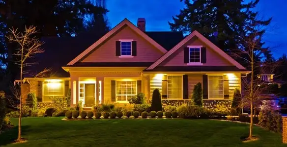security light installation services illuminating a residential exterior at night in Baltimore, MD
