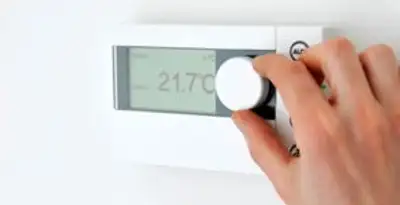 Thermostat installation service with professional adjusting temperature control in Baltimore, MD