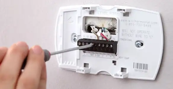 Thermostat installation service with proper wiring and secure wall mounting in Baltimore, MD